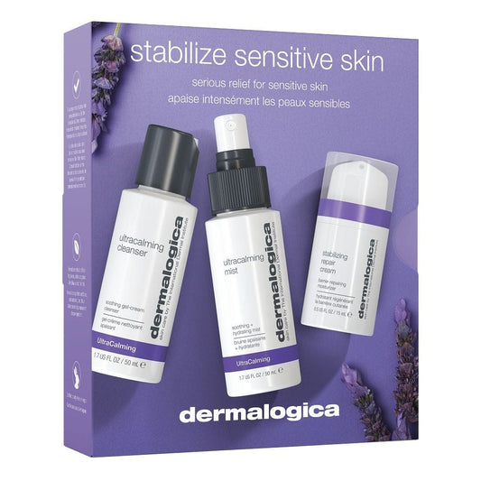 Das „Stabilizing Sensitive Skin Set“ für empfindliche Haut enthält den UltraCalming-Reiniger, das Gesichtsspray und das Barriere-Reparaturprodukt in einer violetten Schachtel mit Lavendelzweigen – lindert Rötungen.