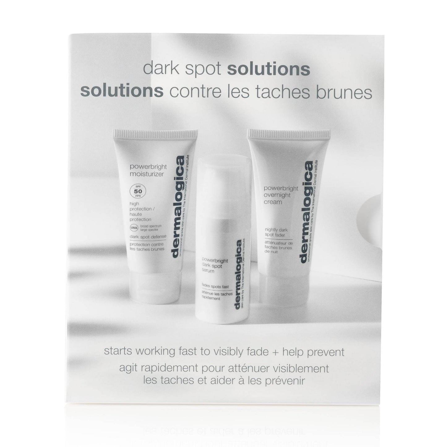 Drei Hautpflegeprodukte von aus der 'Dark Spot Solutions'-Serie, aufgestellt vor einer Werbetafel mit Produktbeschreibungen.