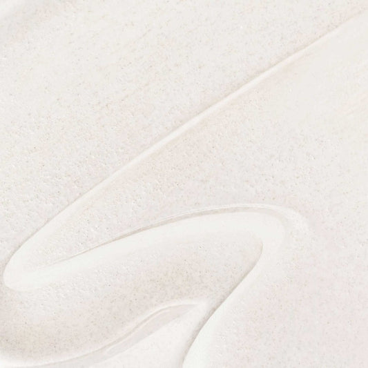 Nahaufnahme von Porescreen SPF40, einer glatten, cremeweißen Formel mit welliger Textur, angereichert mit Niacinamid zur Minimierung der Poren.