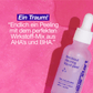 Flasche des Breakout Clearing Liquid Peel Hautpflegeprodukts mit Texten, die dessen Vorteile beschreiben, auf einem rosa Hintergrund.